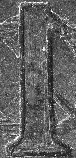 Fake die numeral enlarged